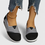 EDYTA | Wsuwane sneakersy w paski