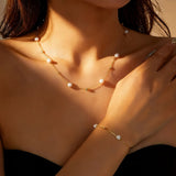Delikatny komplet z perłami